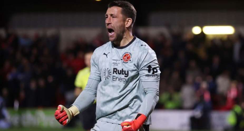 Getty ImagesImage caption: Fleetwood keeper Jay Lynch saved Bruno Guimaraes penalty, Arsenals fourth, to set his side on their way to an improbable victory