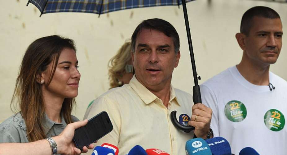 Opposition presidential candidate Sen. Flavio Bolsonaro speaks to journalists after voting in the presidential runoff in Rio de Janeiro, Oct. 25, 2026 -  Lucas Landau, AP