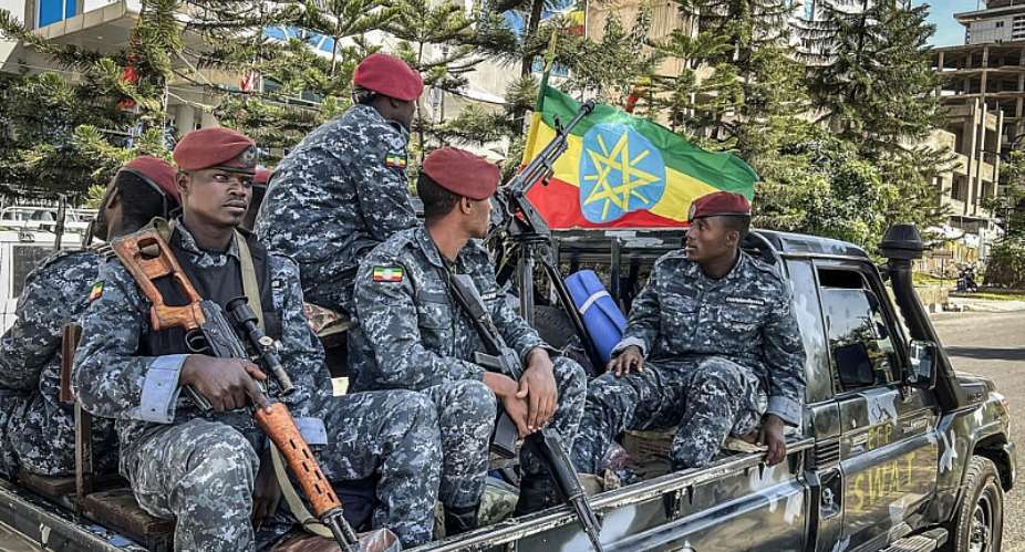 Members of the Ethiopian Federal Police (EFP) patrol aboard a pickup truck as they resume operations after federal forces pushed back the rebel Tigray Peoples Liberation Front (TPLF) in Mekelle on October 9, 2026. -  AFP