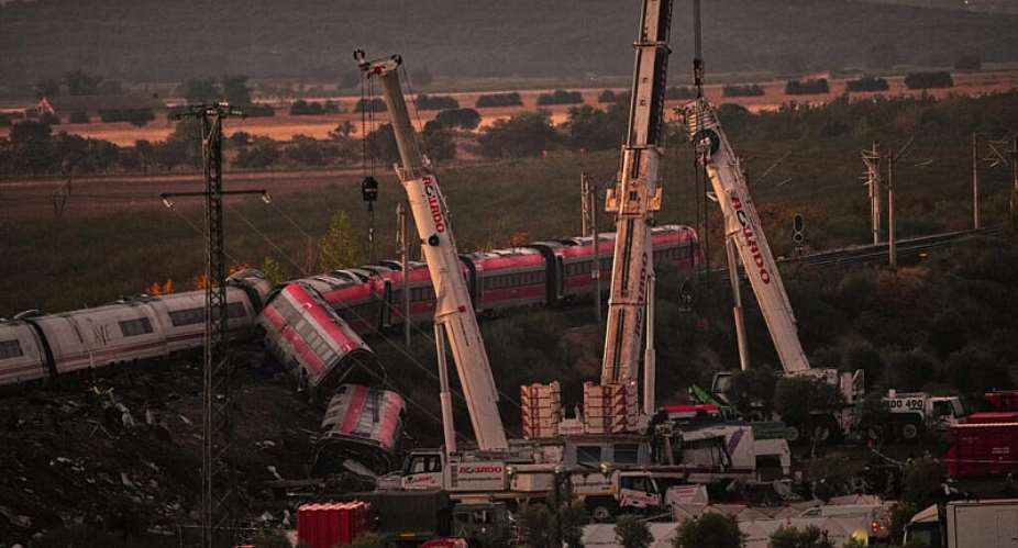 Emergency services worked overnight to sift through the wreckage of the train collision south of Madrid that left at least 68 people dead and more than 100 injured. -  Manu Fernandez / AP
