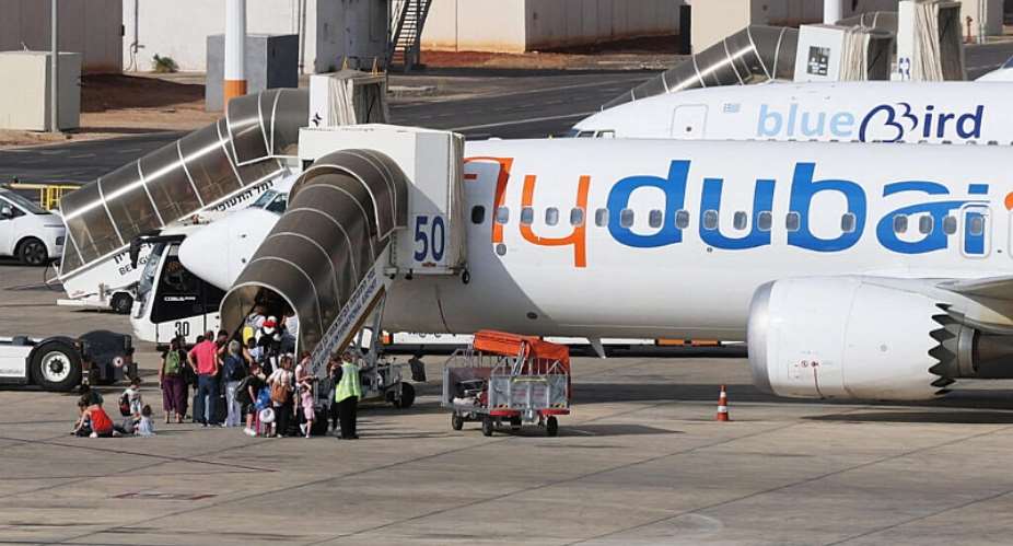 Travelers board a FlyDubai aircraft at Ben Gurion International Airport after a separate FlyDubai flight from the United Arab Emirates to Israel was diverted to Saudi Arabia following an emergency signal, in Lod, near Tel Aviv, Israel on September 30, 2026. -  Ammar Awad, Reuters