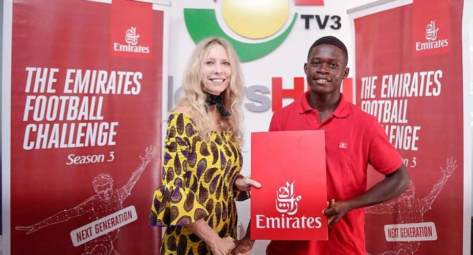 COUNTRY MANAGER OF EMIRATES, CATHRINE WESLEY PRESENTING THE TICKETS TO ABU SAMUEL