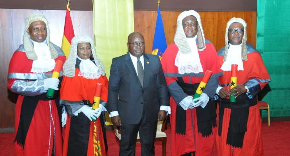 President Akufo-Addo in a group photograph with the newly sworn in Supreme Court Judges