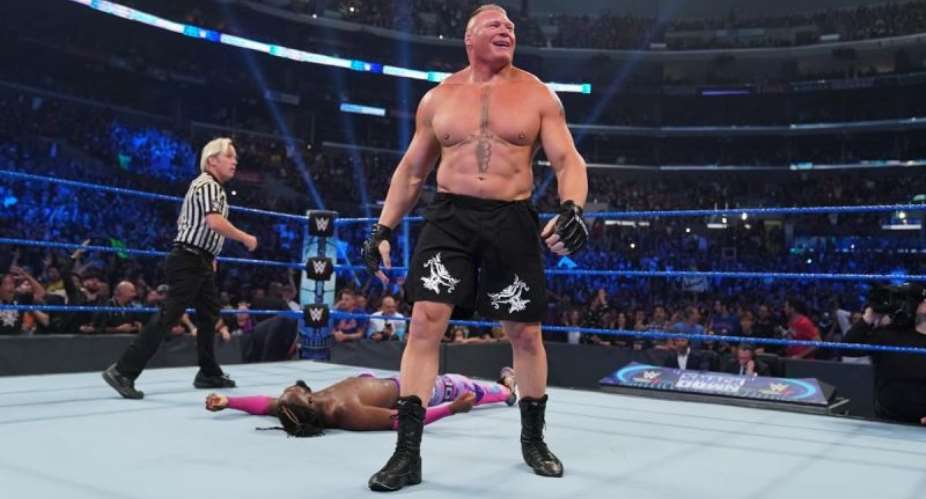 Defeated Kofi Kingston lies in the ring - photo credit: WWE