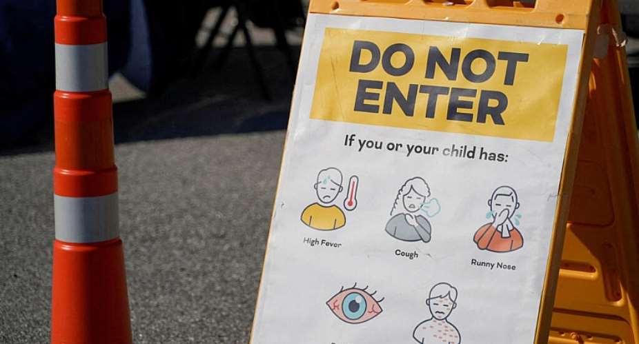 FILE PHOTO: A sign warning against measles symptoms stands outside a South Carolina Department of Public Health Mobile Health Unit in Spartanburg, South Carolina, on February 6, 2026. -  JaylaWhitfield-Anderson, Reuters