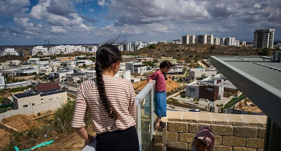 Residents gather on a hill on October 1, 2026, in Sderot, one of the areas in southern Israel attacked by Hamas three years prior. -  Oded Balilty, AP
