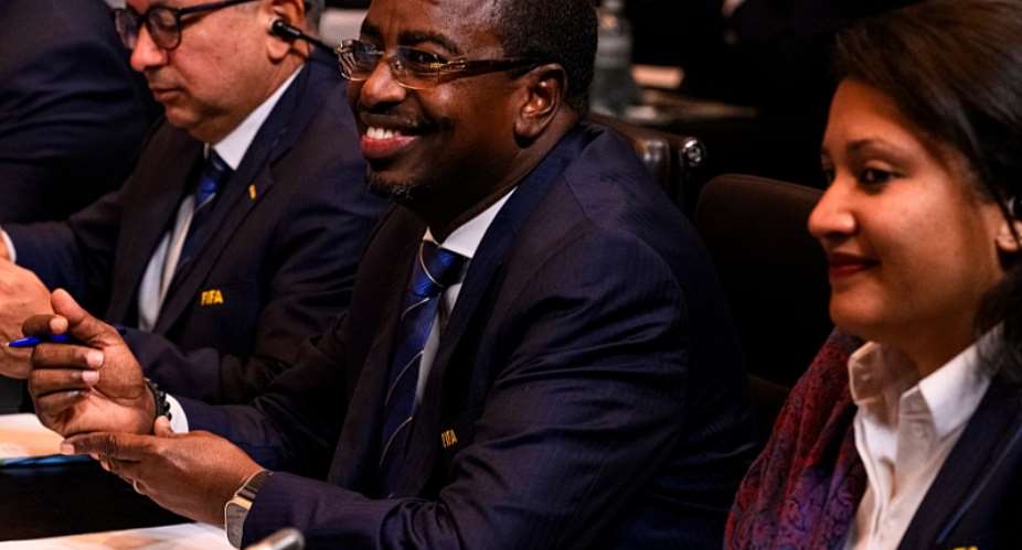 Souleiman Waberi (centre) pictured at a Fifa council meeting last October. Photograph: Marcio Machado/Fifa/Getty Images