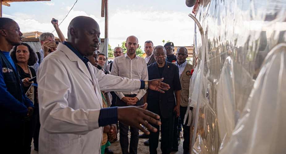 Jean-Nol Barrot (C), Frances Minister for Europe and Foreign Affairs, visits the Ebola Treatment Centre Rwanpara in Bunia to express Frances support for those involved in the response to the outbreak on 3 October, 2026. -  HARDY BOPE / AFP