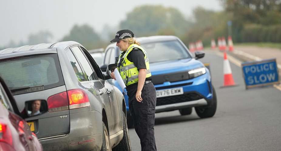File photo of police officers  at a checkpoint near RAF Fairford air base, in Fairford, UK, taken September 29, 2026. -  Alastair Grant, AP