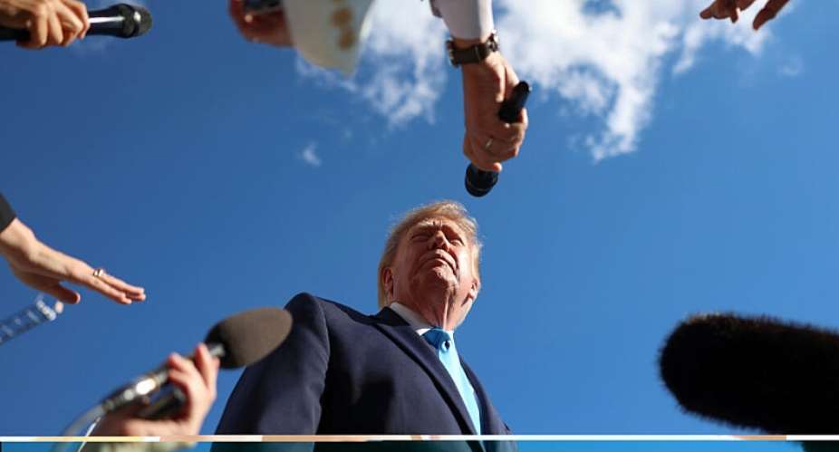 President Donald Trump speaks to reporters before boarding Marine One on the South Lawn of the White House on October 5, 2026. -  Tom Brenner, AP