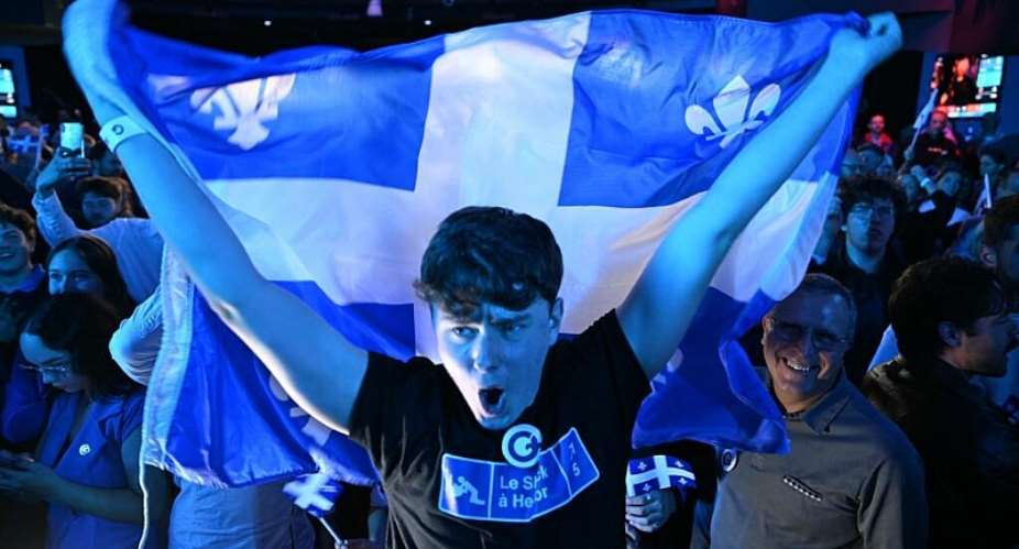 Supporters of the separatist Parti Quebecois celebrate results in Canadas provincial election. -  Andrej Ivanov, AFP