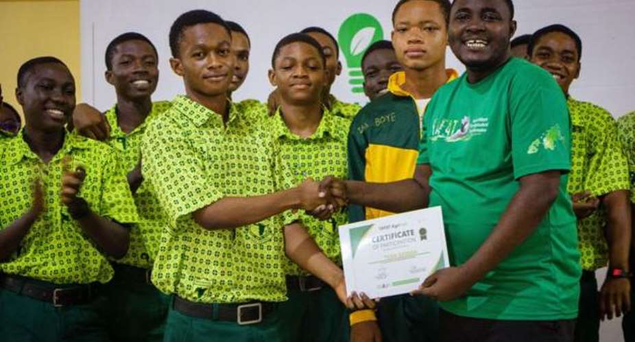 Team Gamma receiving their certificate for winning the competition