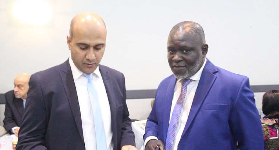 Manish Sharma In A Handshake With Dr Kwabena Ekremet