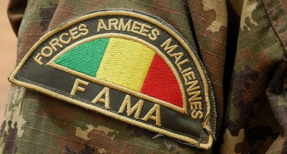 The insignia of a member of the Malian Army (FAMA) in Anderamboukane, in the Mnaka region. - AFP - AGNES COUDURIER