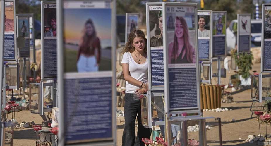 People visit the site of the Nova music festival near Kibbutz Reim, southern Israel, on October 5, 2026. -  Ohad Zwigenberg, AP
