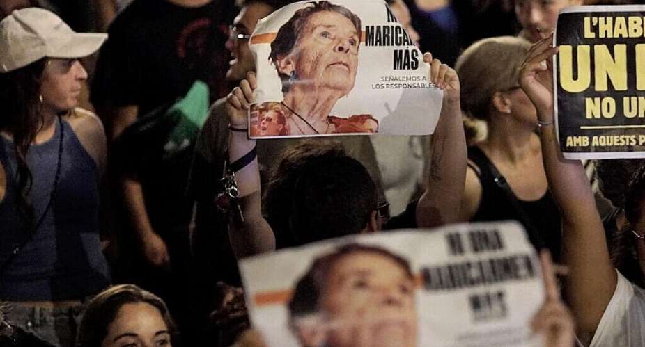 Demonstrators hold signs reading Not a single more Maricarmen during a protest against evictions and high rent prices in Barcelona on October 5, 2026. -  Manaure Quintero, AFP