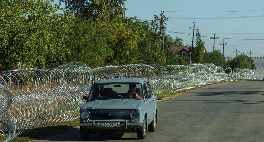 A file image of a car along a street with installed razor wire in the city of Kramatorsk, Donetsk region, Ukraine, September 9, 2026. -  Serhii Korovainyi, Reuters