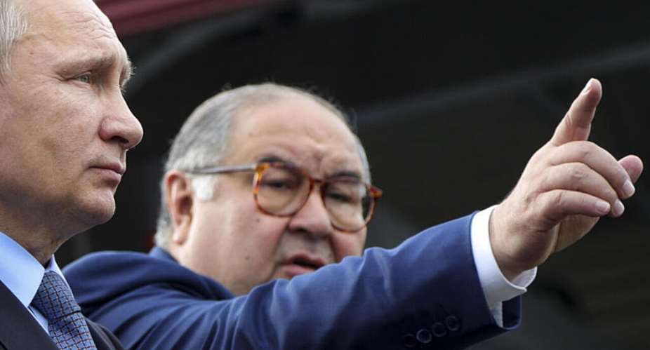 Russian-Uzbek billionaire Alisher Usmanov (right) pictured with Russian President Vladimir Putin in 2017. -  Mikhail Klimentyev, Sputnik, Kremlin Pool Photo via AP