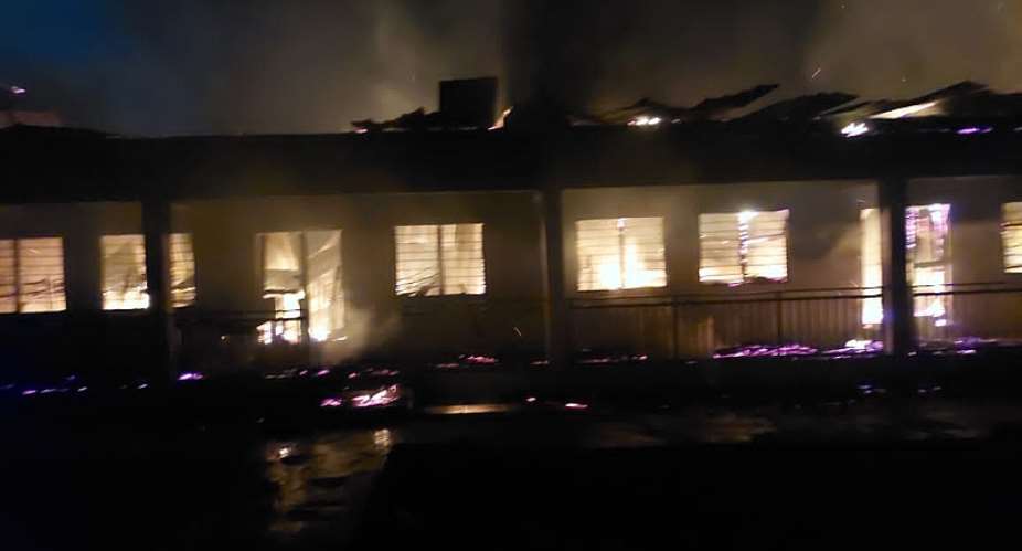AR: Angry form 3 students of Nyinahin Catholic SHS set boys dormitory ablaze for not allowing them cheat in WASSCE, block fire personnel