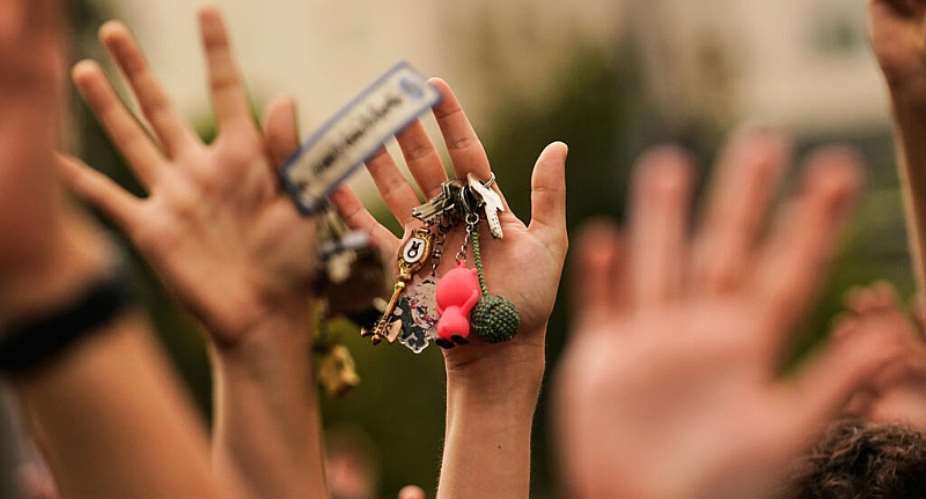 People hold up keys as a sign of protest during a demonstration demanding stronger laws to protect renters in Madrid, Spain, 3 October 2026. -  AP Photo/Andrea Comas