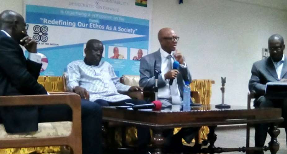 Albert Kan-Dapaah (second left), with Justice Emile Short (second right) during a panel discussion at the symposium