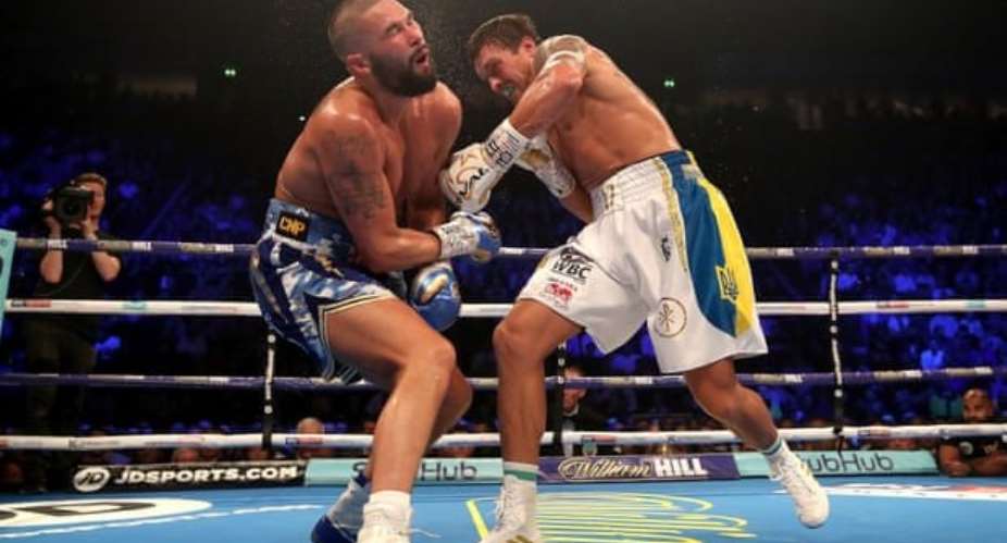 Oleksandr Usyk sends Tony Bellew reeling on the way to his victory over the Liverpudlian at the Manchester Arena. Photograph: Nick PottsPA