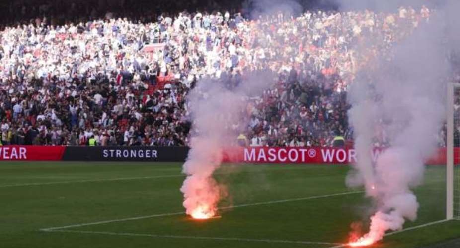 Ajax fined and forced to shut section of their stadium due to crowd trouble in abandoned Feyenoord match