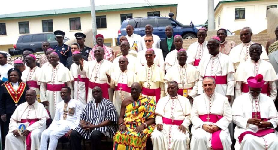 Most Rev. Philip Naameh, President of the Ghana Catholic Bishops Conference 3rd right, Mr Kwamena Duncan 2nd left, Central Regional Minister, and Osabarimba Kwesi Atta II middle, the Omanhen of the Oguaa Traditional Area, with members of the conference