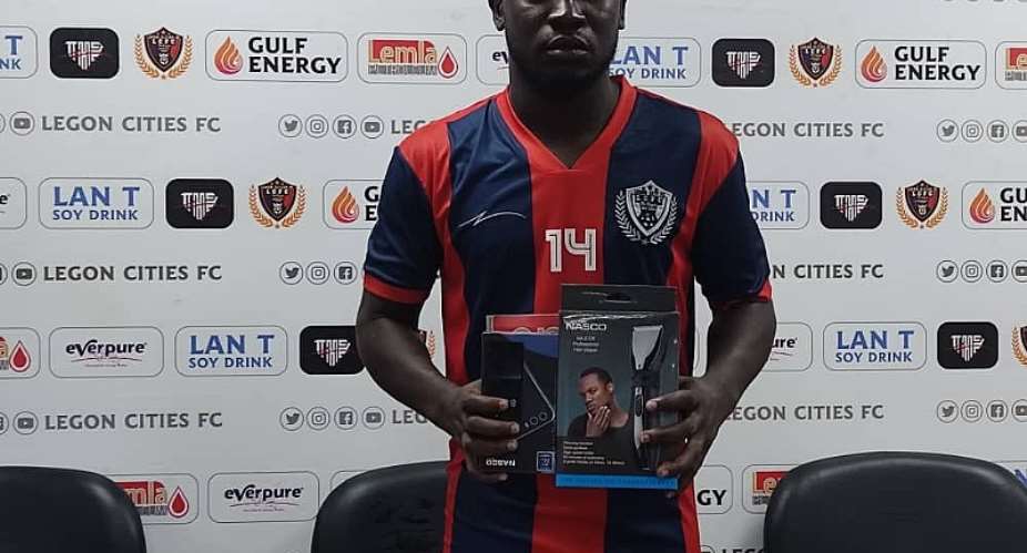 Elvis Opoku with his 'Man of the Match' prizes