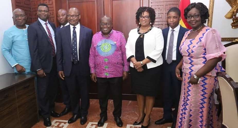 President Akufo-Addo in a group photograph with the Deposit Protection Scheme Board Members