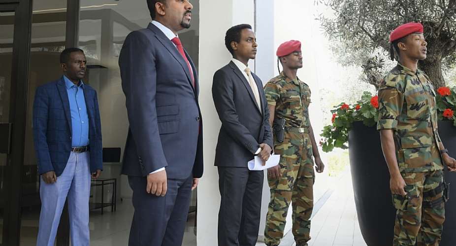 Prime Minister of Ethiopia Abiy Ahmed centre pictured outside his office awaiting dignitaries in February 2020. - Source: EPA-EFESTR