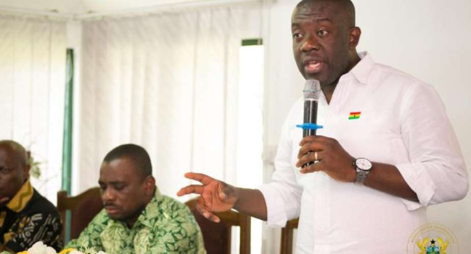 Information Minister, Kojo Oppong Nkrumah addressing a group of cocoa farmers.