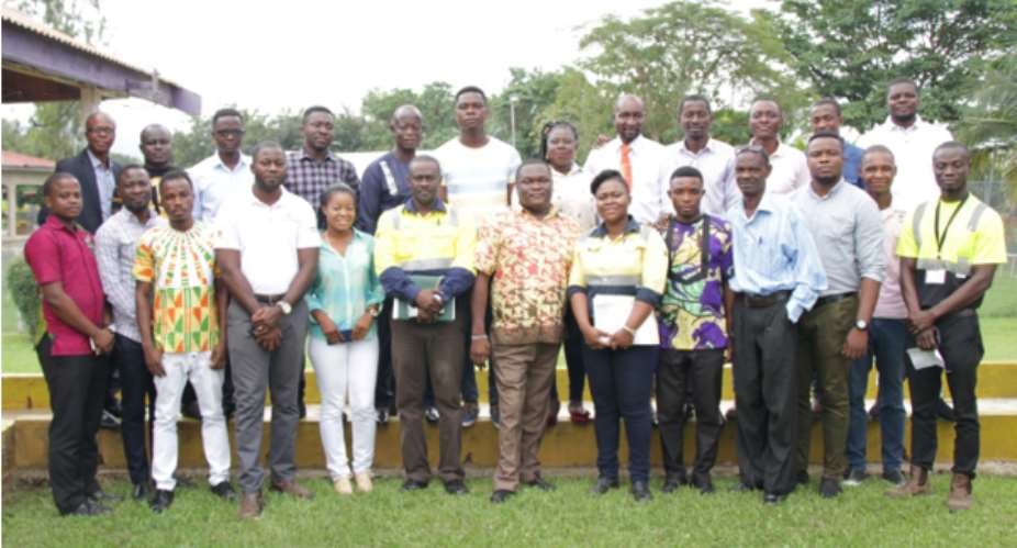 Nana Ampofo-Bekoe, Sustainability Manager 6th from right in a group photograph with the facilitator and the journalists 