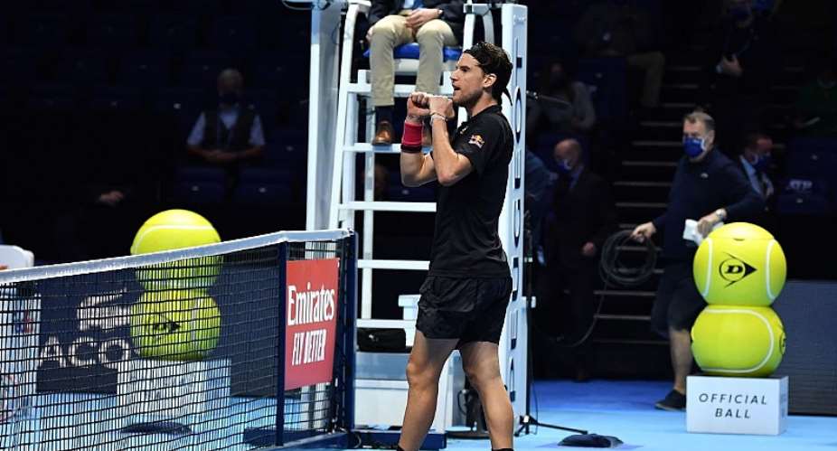 Austria's Dominic Thiem reacts after his victory over Serbia's Novak Djokovic in their men's singles semi-final match on day seven of the ATP World Tour Finals tennis tournament at the O2 Arena in LondonImage credit: Getty Images