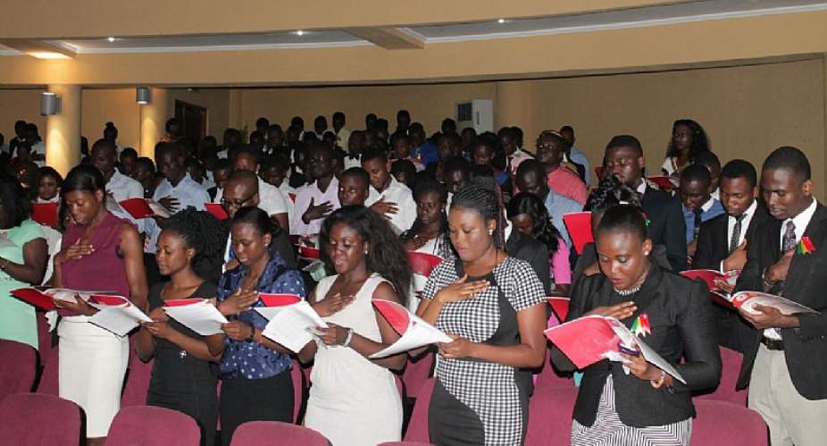 The students taking their oath at the induction ceremony