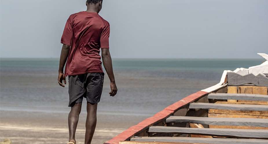 Sheikul narrates his migration experience while on an empty boat, similar to the one he traveled on. Photo: IOM2021