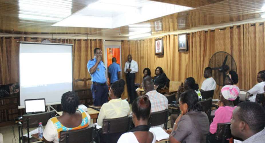 A custom official taking the participants through the training