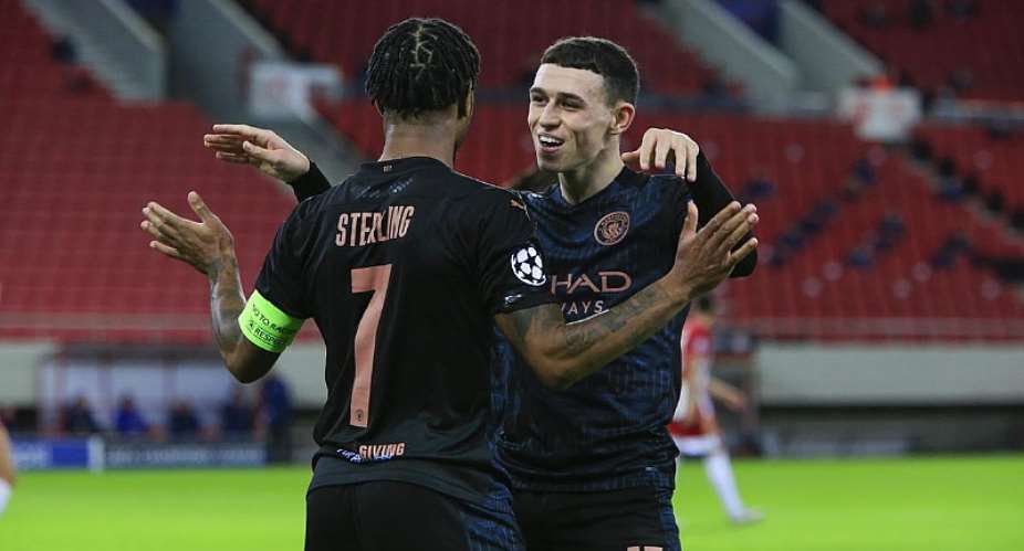 Phil Foden of Manchester City celebrates his goal with Raheem Sterling of Manchester CityImage credit: Getty Images