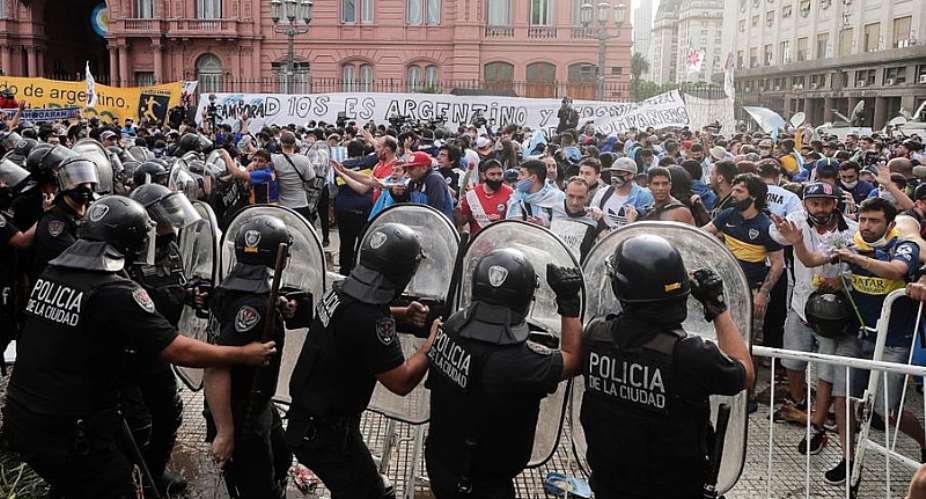 Police clash with fans of Diego Maradona  Getty Images