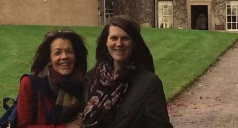 Family photobombed by mysterious 'ghostly figure carrying baby' during visit to haunted castle