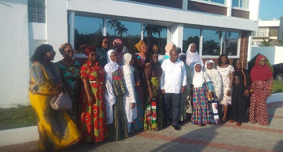 John Mahama in group photograph with members of the Federation of Muslim Women of Ghana, FOMWAG