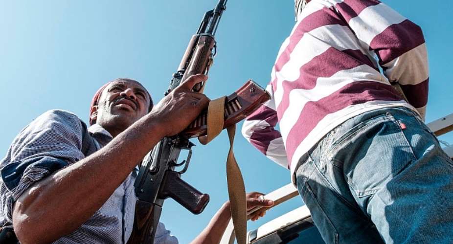 Members of the Amhara militia ride in the back of a pick up truck, in Mai Kadra, Ethiopia, on November 21, 2020. Amharas and Tigrayans were uneasy neighbours before the current fighting. - Source: Photo by Eduardo SoterasAFP via Getty Images