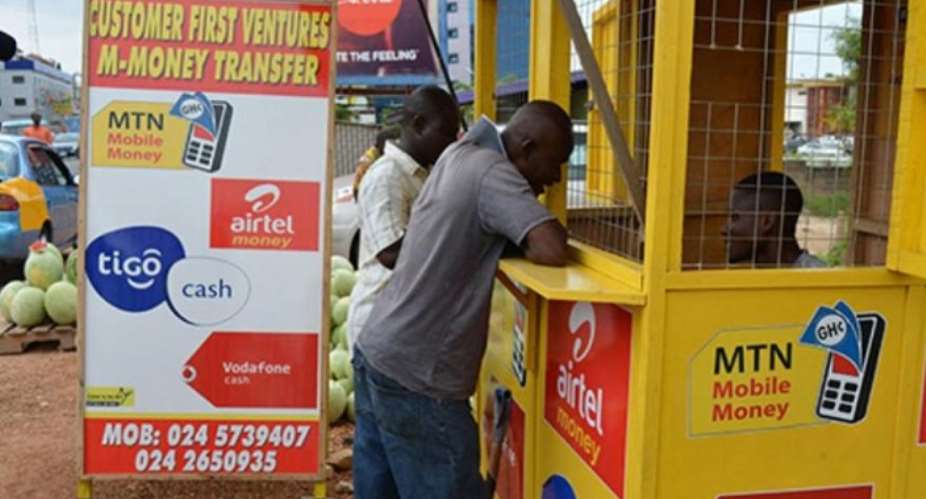 Mobile money transaction in Ghana, photo credit: Ghana media