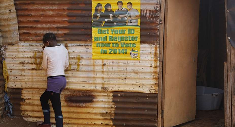 Many poor families in South Africaamp;39;s informal settlements survive on welfare grants. - Source: EFE-EPAKim Ludbrook