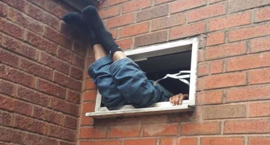 Burglar Stuck In Window After Botched Break-In