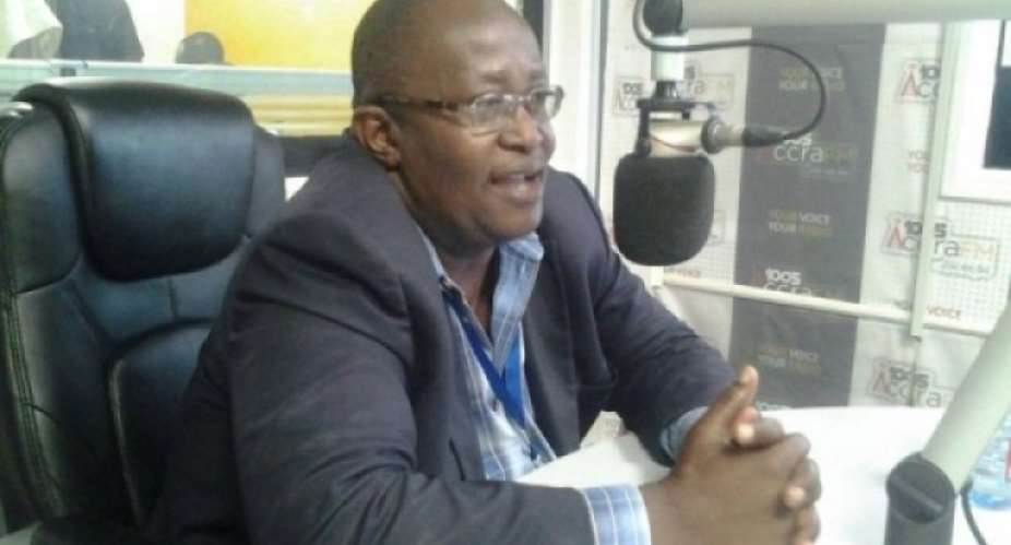 local governance expert, Issaka Amon Kotei