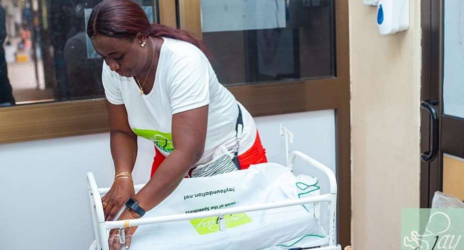 Naa Kuorkor Mayne-Eghan donating to a NICU