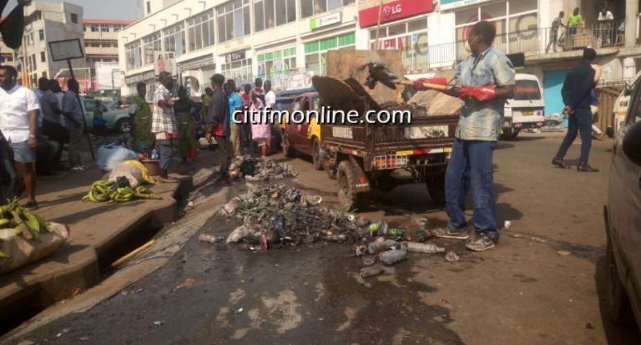 Kumasi residents clean city ahead of Queenmothers burial rites Photos