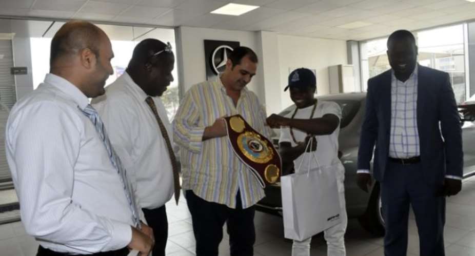 Dogboe Presents Title To Key Partner Silver Star Auto