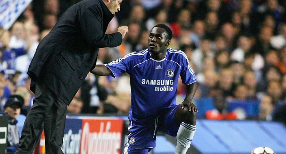 Michael Essien takes instructions from Jose Mourinho